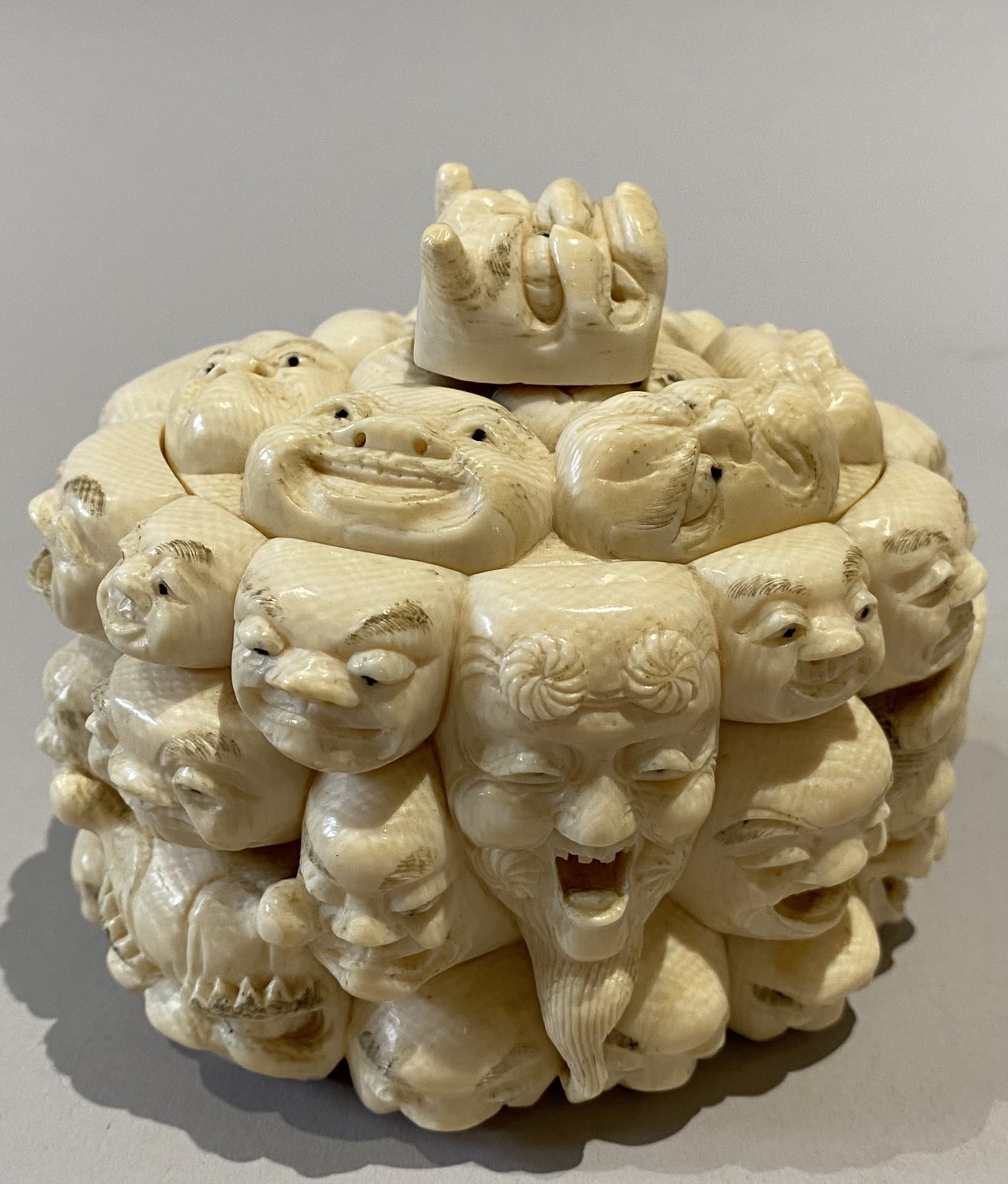 A JAPANESE IVORY DEVIL BOX AND COVER, MEIJI/TAISHO PERIOD