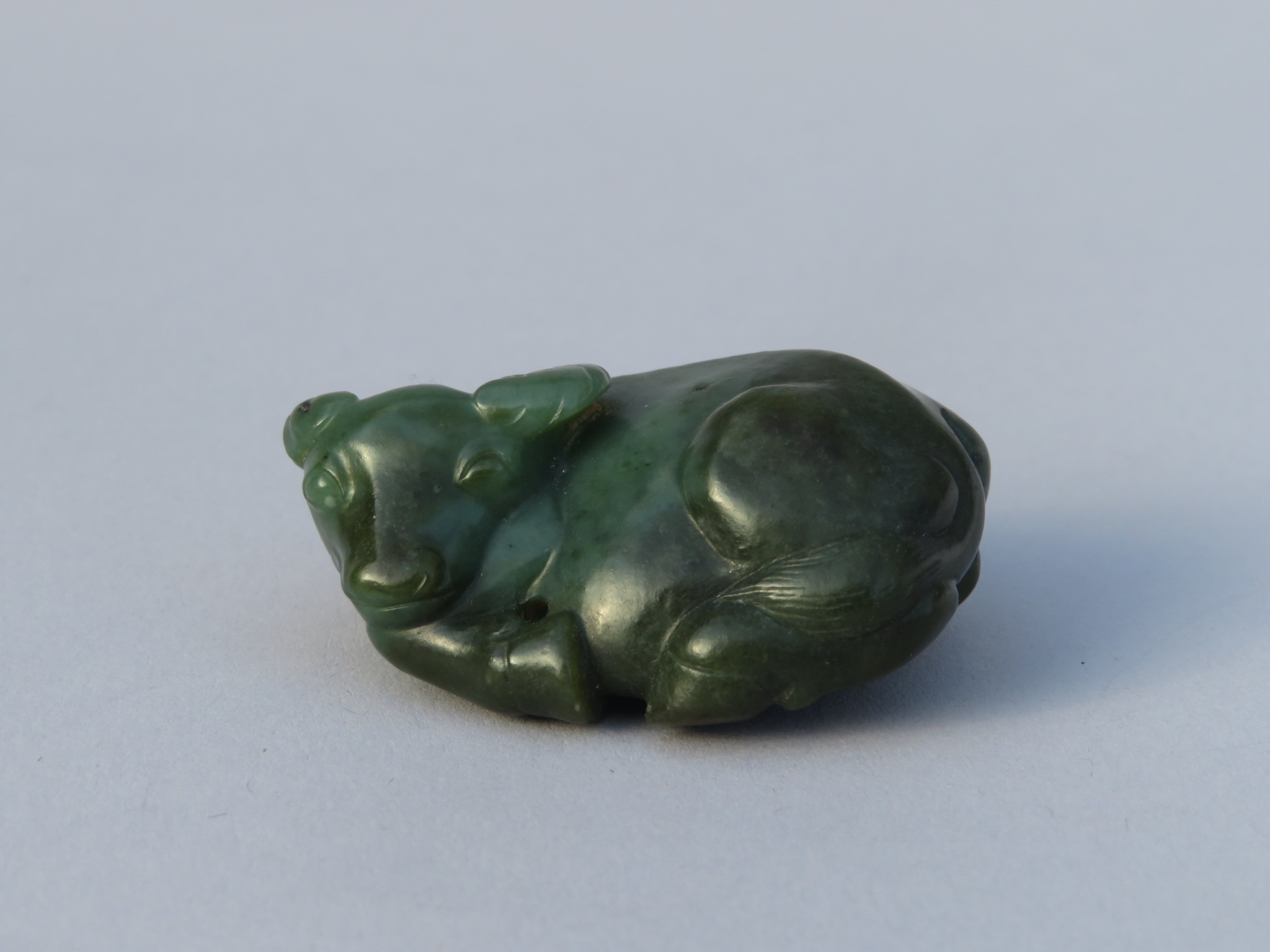 A CHINESE GREEN JADE CARVING OF A RECUMBENT WATER BUFFALO, QING DYNASTY - Image 5 of 13
