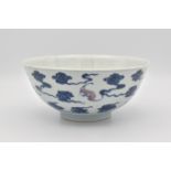 A CHINESE PORCELAIN UNDERGLAZE-BLUE AND COPPER-RED ‘BAT’ BOWL, QING DYNASTY, SEAL MARK AND PERIOD OF
