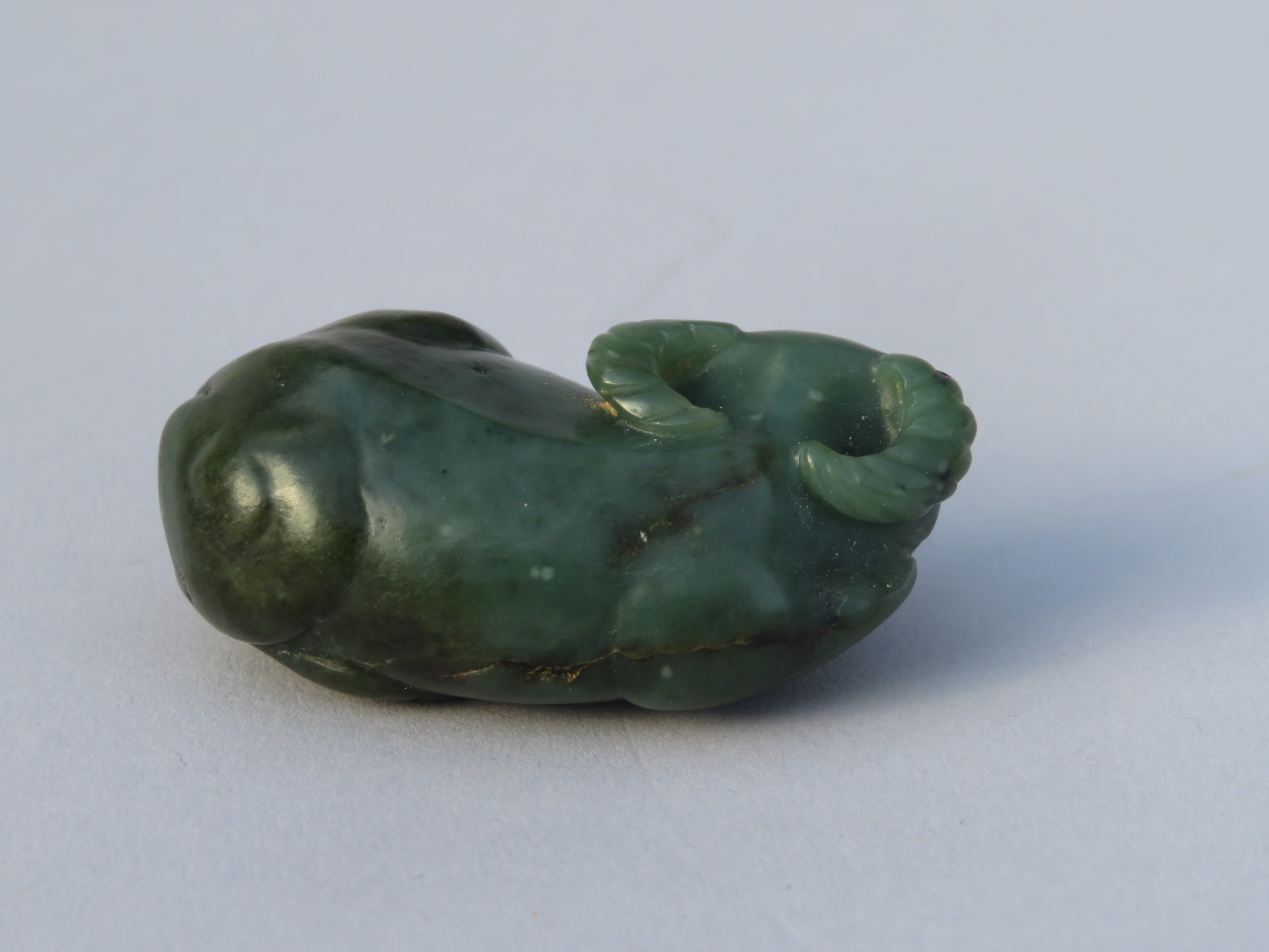 A CHINESE GREEN JADE CARVING OF A RECUMBENT WATER BUFFALO, QING DYNASTY - Image 6 of 13