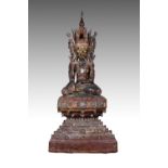 A LARGE BURMESE LACQUERED WOOD BUDDHA, LATE 19TH CENTURY