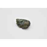 A CHINESE GREEN JADE CARVING OF A RECUMBENT WATER BUFFALO, QING DYNASTY