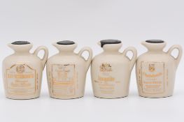 Twenty four assorted whisky miniatures in ceramic jug decanters