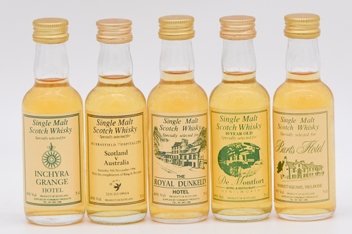 Thirty two assorted hospitality and commemorative miniature whiskies
