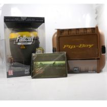 Fallout Anthology PC DVD-ROM set and Fallout 4 Pip-Boy edition.