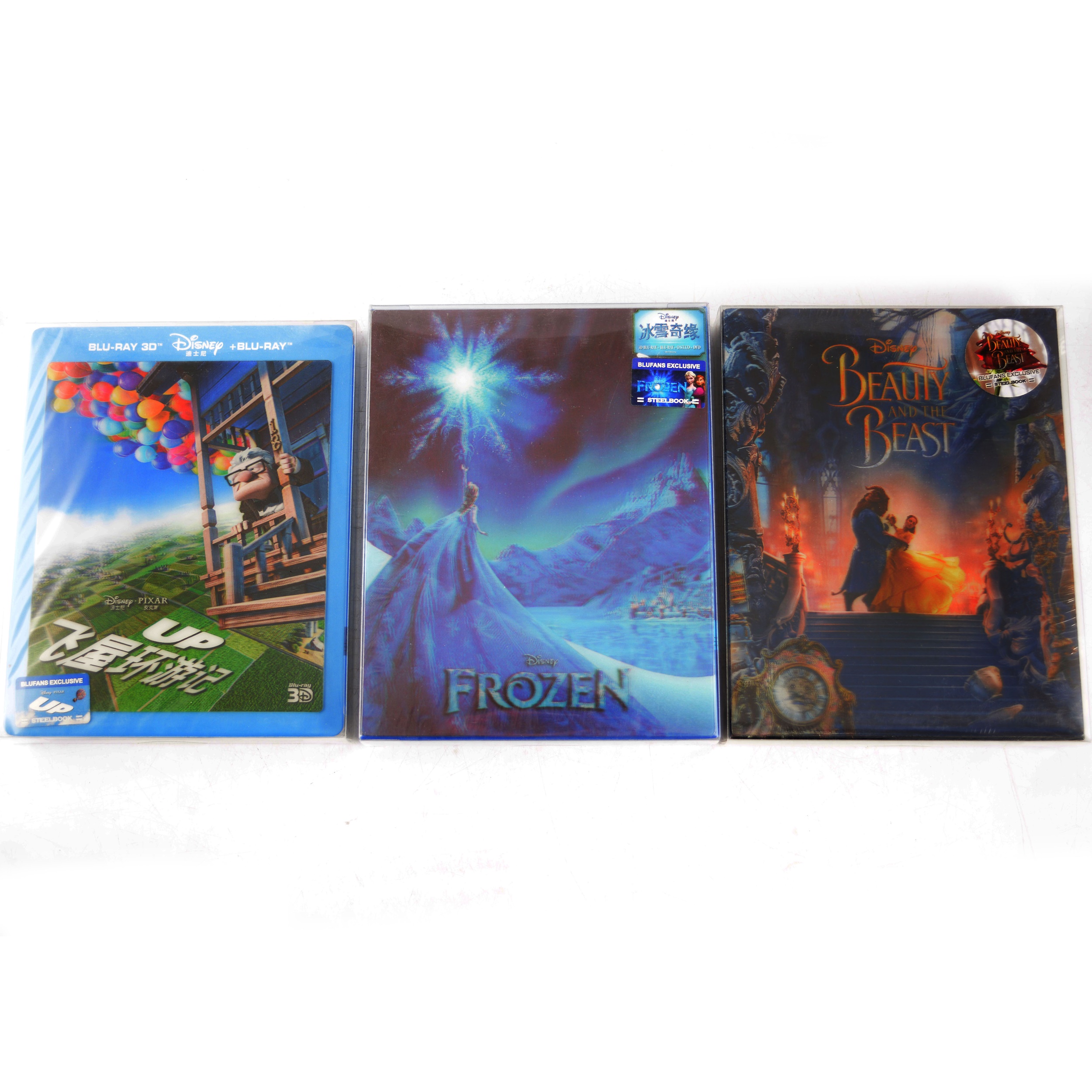 Three Blufans Exclusive Steelbook Lenticular Blu-rays; Frozen, Up, Beauty and the Beast.