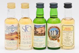 Thirty four assorted whiskies, including bottlings for sporting events, Highland Games