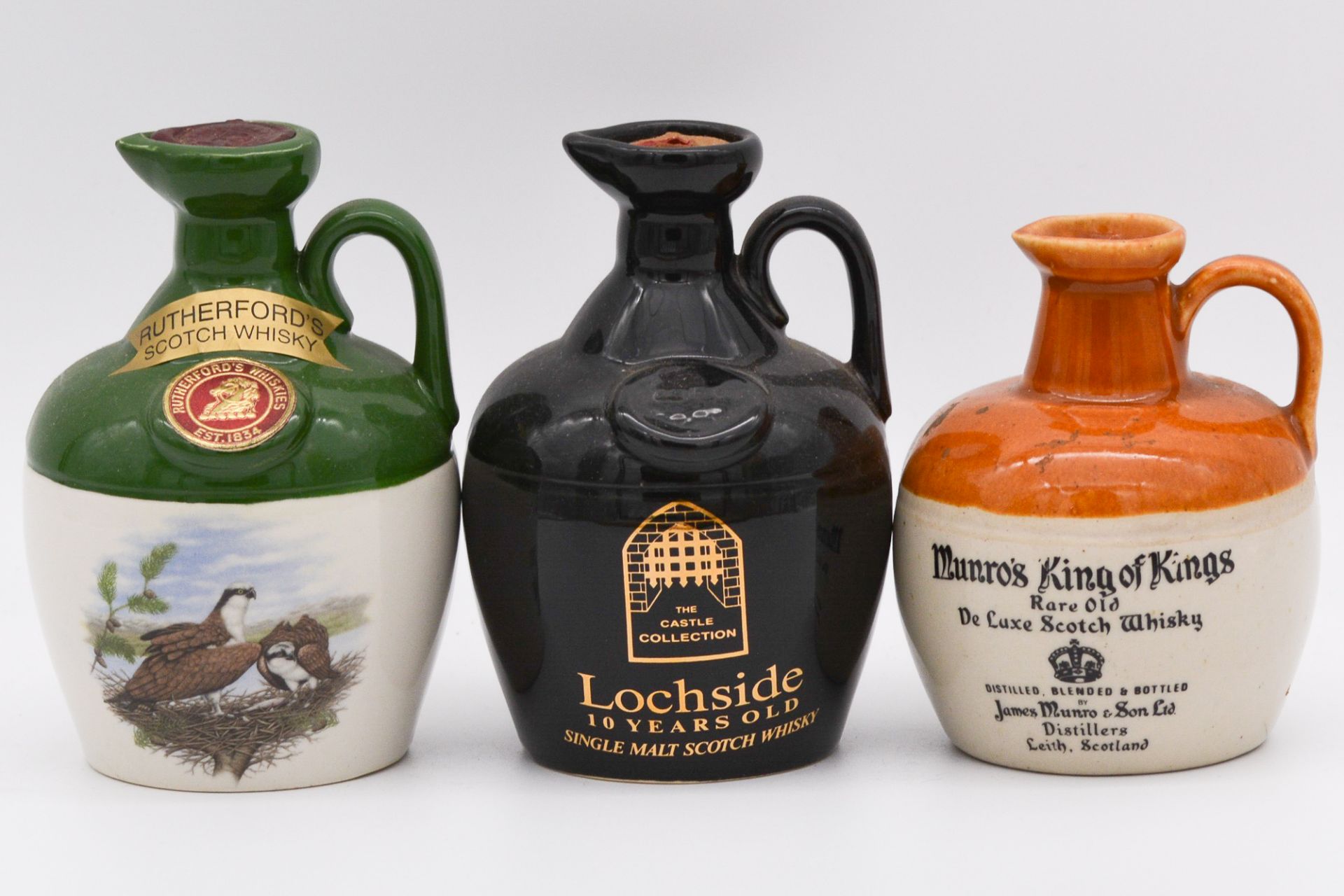Four Rutherford's 12 year old ceramic decanters, and two others - Image 2 of 2
