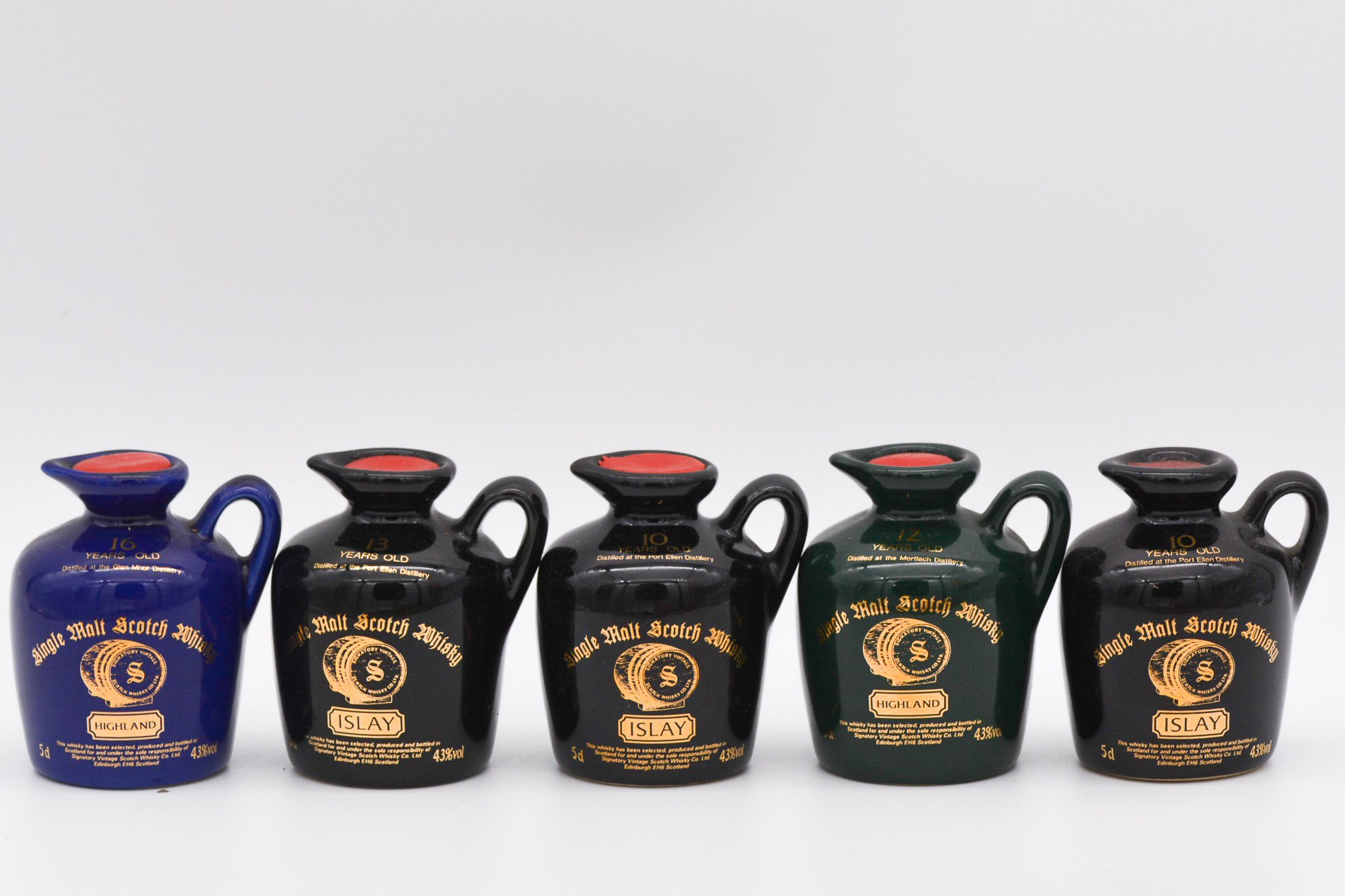 Signatory Vintage, five ceramic miniature decanters