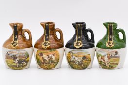 Twenty four assorted Rutherford's ceramic decanters