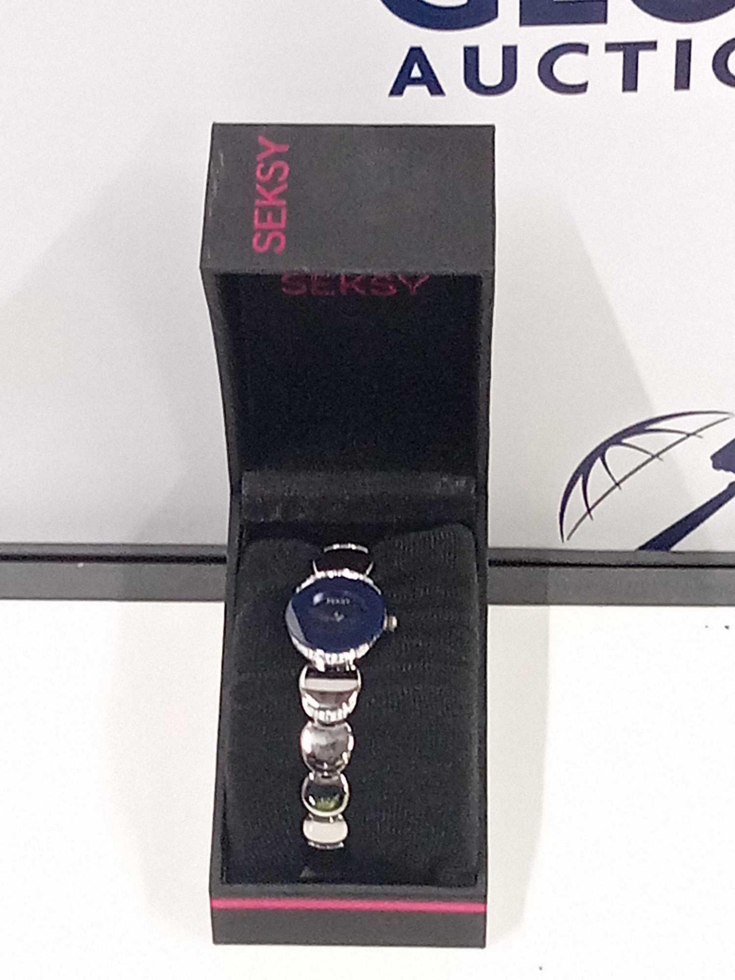 RRP £110 Boxed Seksy Silver And Crystal Blue Face Plated Watch