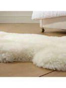 Combined RRP £130 Lot To Contain Two Bagged John Lewis Luxurious Sheepskin Rugs In Colour Ivory