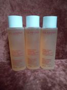 RRP £70 Gift Bag To Contain 2 Brand New Sealed And 1 Unused Clarins Extra-Comfort Toning Lotion With