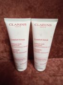 RRP £70 Gift Bag To Contain 2 Brand New Tester Of Clarins Comfort Scrub Nourishing Oil 100 Ml Each