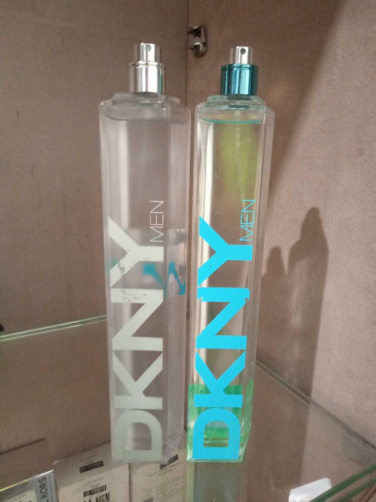 RRP £100 Combined Lot To Contain 2X Unboxed Tester Bottles Of Dkny For Men 100Ml Eau De Toilette