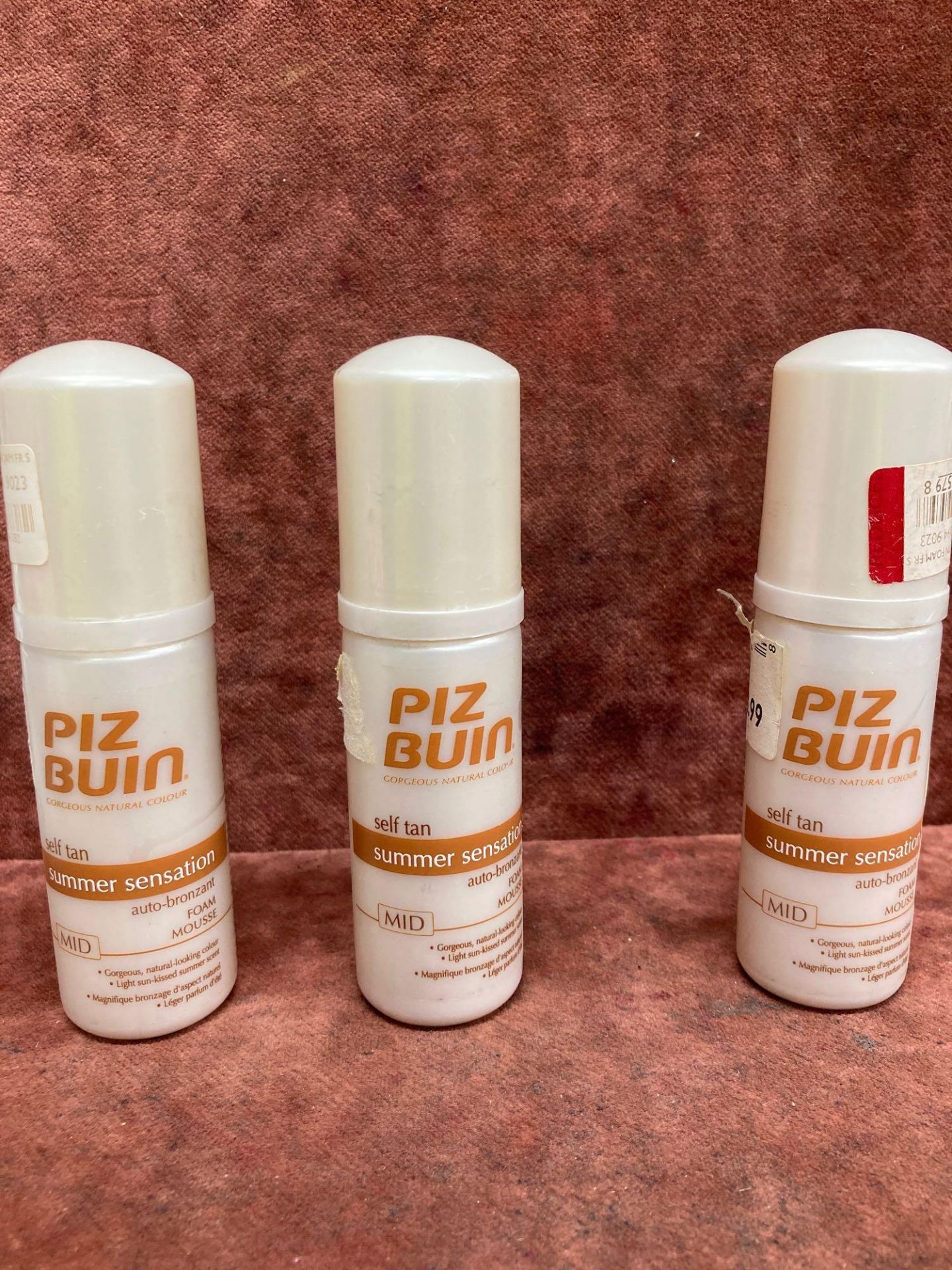 (Jb) RRP £120 Lot To Contain 24 Testers Of Assorted Piz Buin Self Tan Summer Sensation Mousse All As