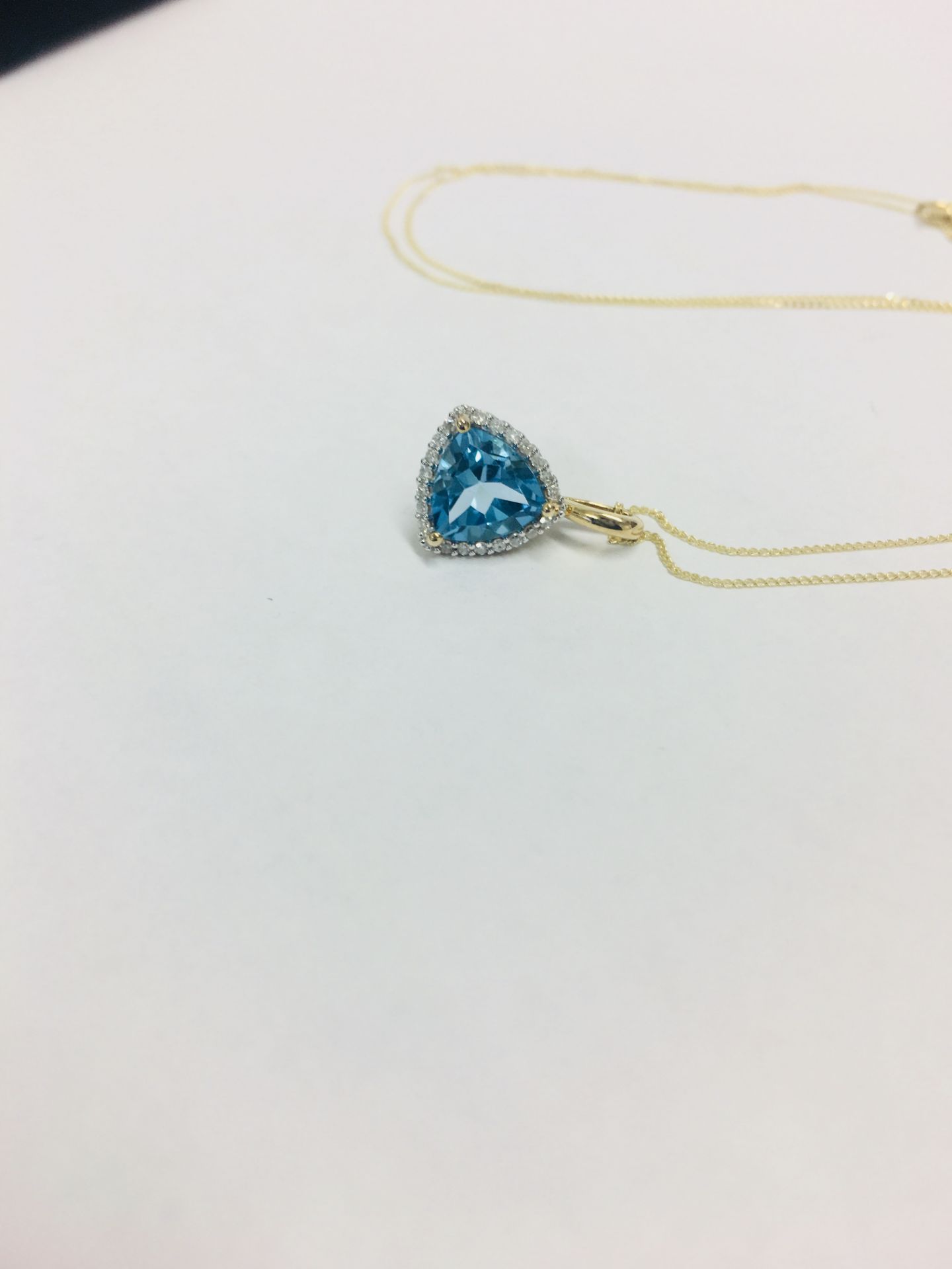 9Ct Yellow Gold Blue Topaz Pendant