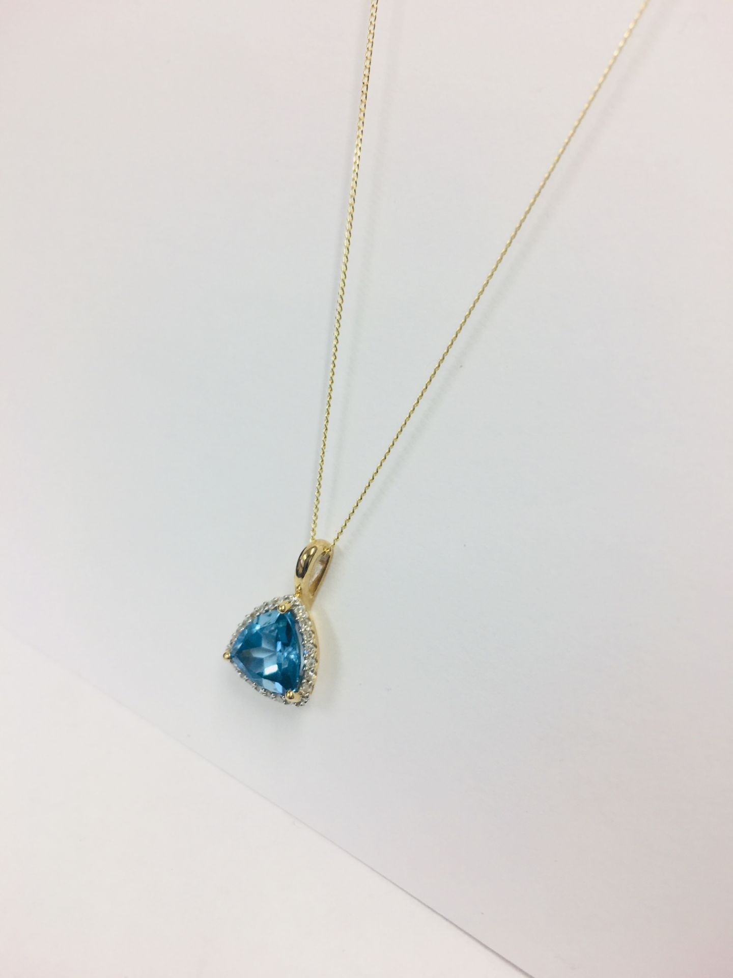 9Ct Yellow Gold Blue Topaz Pendant - Image 2 of 3