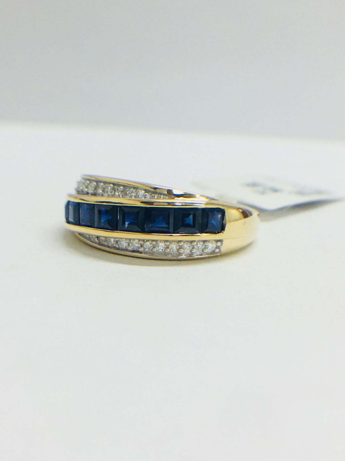 9Ct Yellow Gold Diamond Sapphire Crossover Style Ring