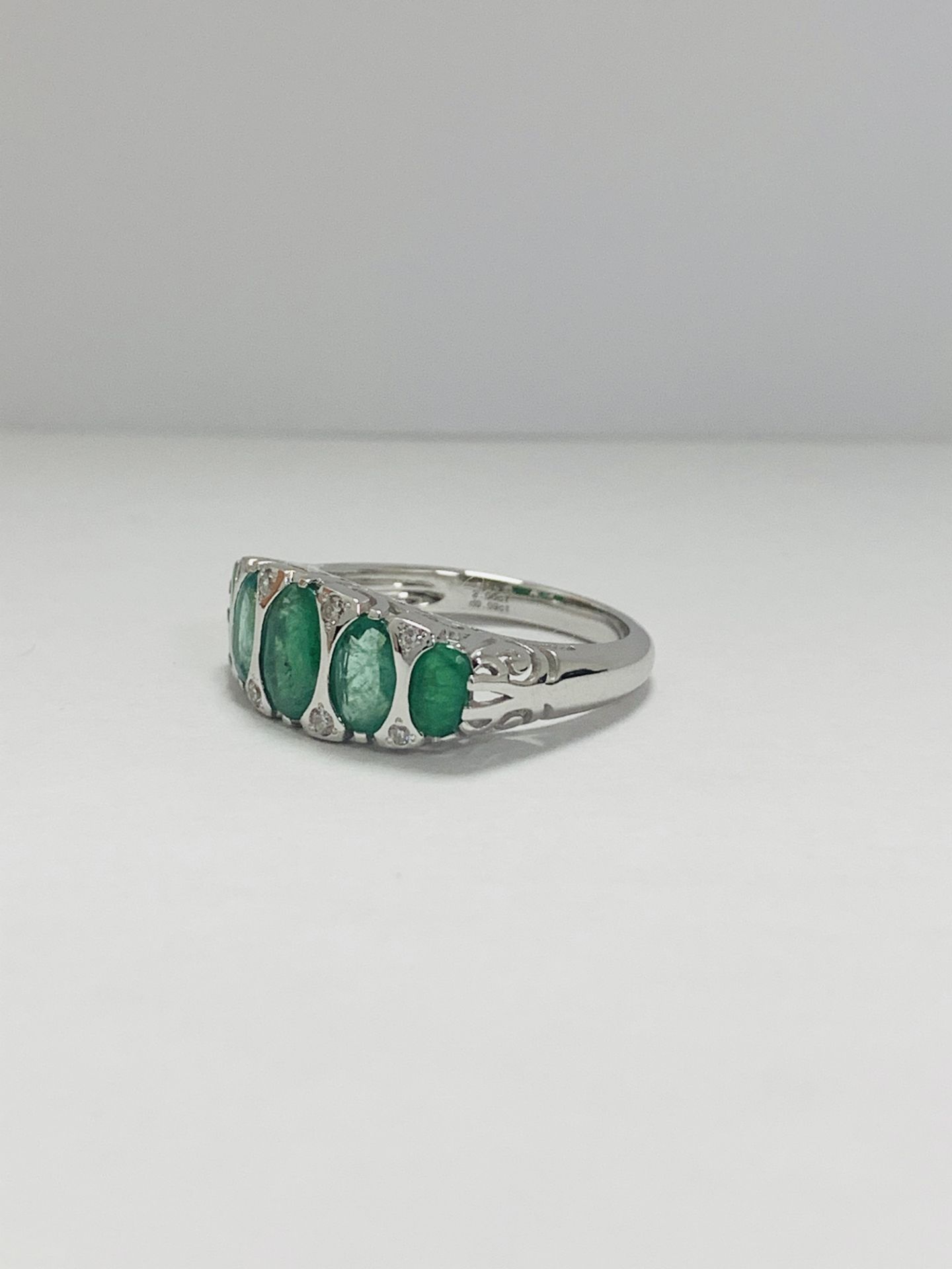 14Ct White Gold Emerald And Diamond Ring