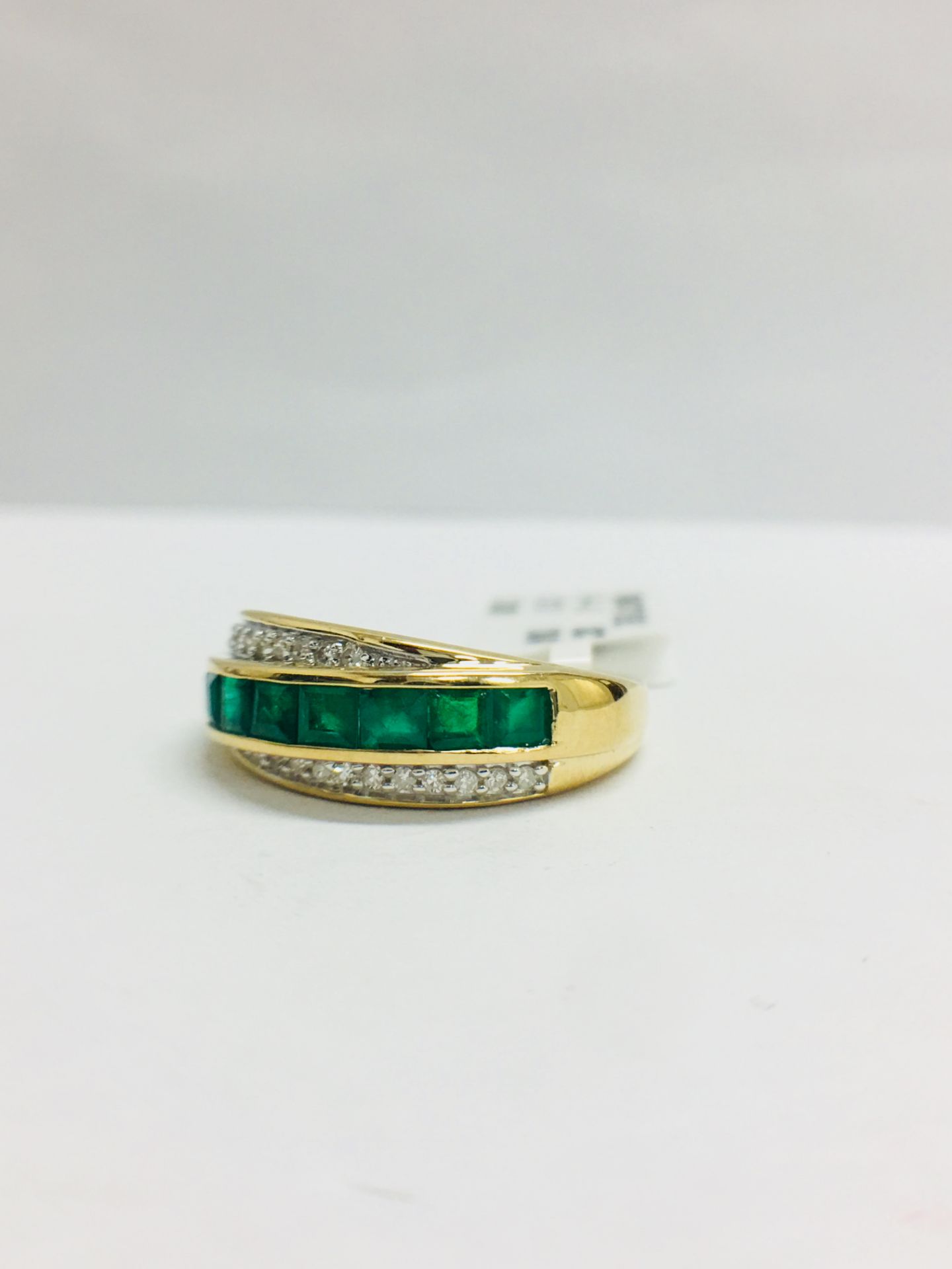 9Ct Yellow Gold Diamond Emerald Crossover Style Ring