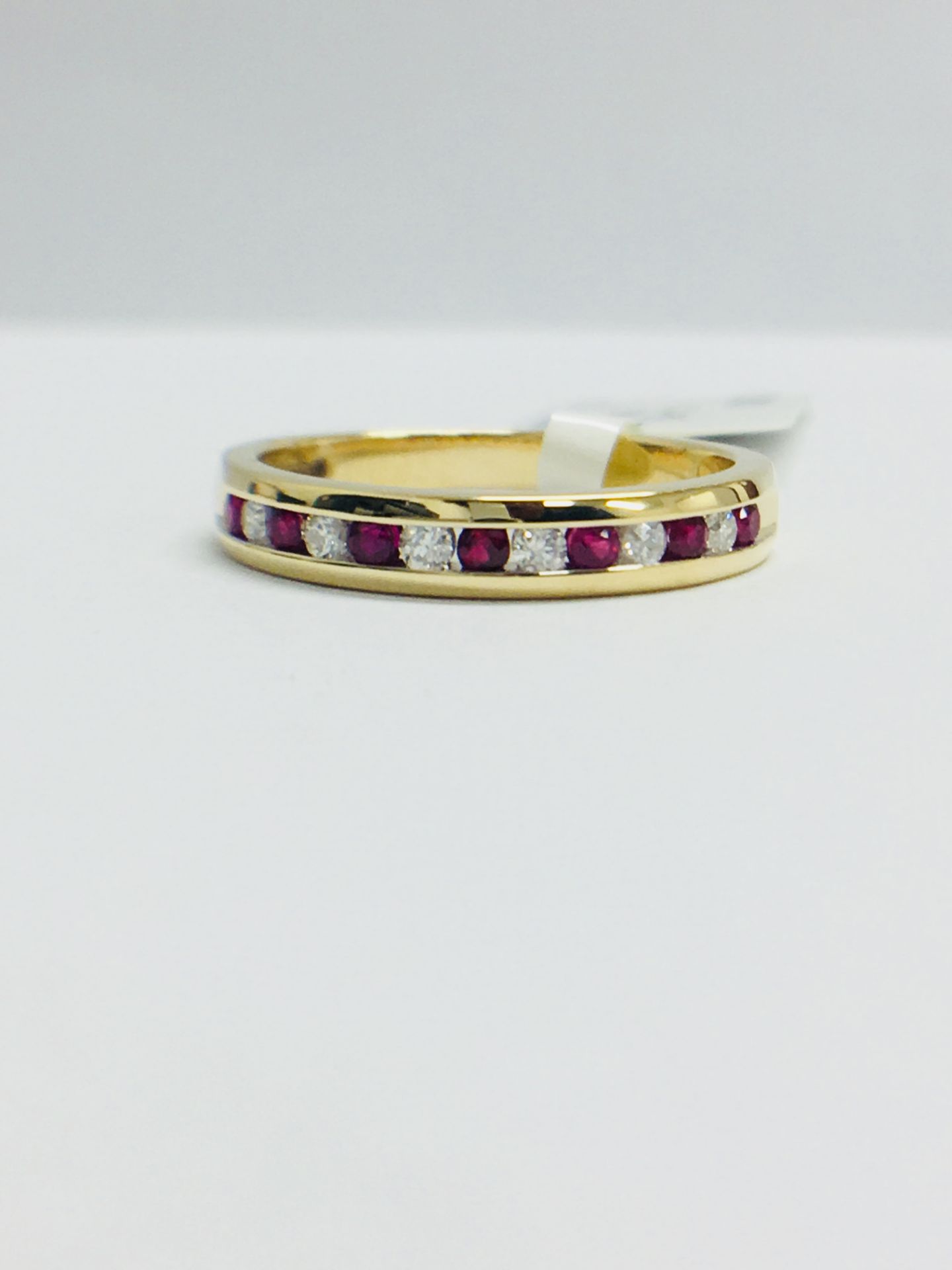 9ct Yellow Gold Ruby And Diamond Channel Set Eternity Ring