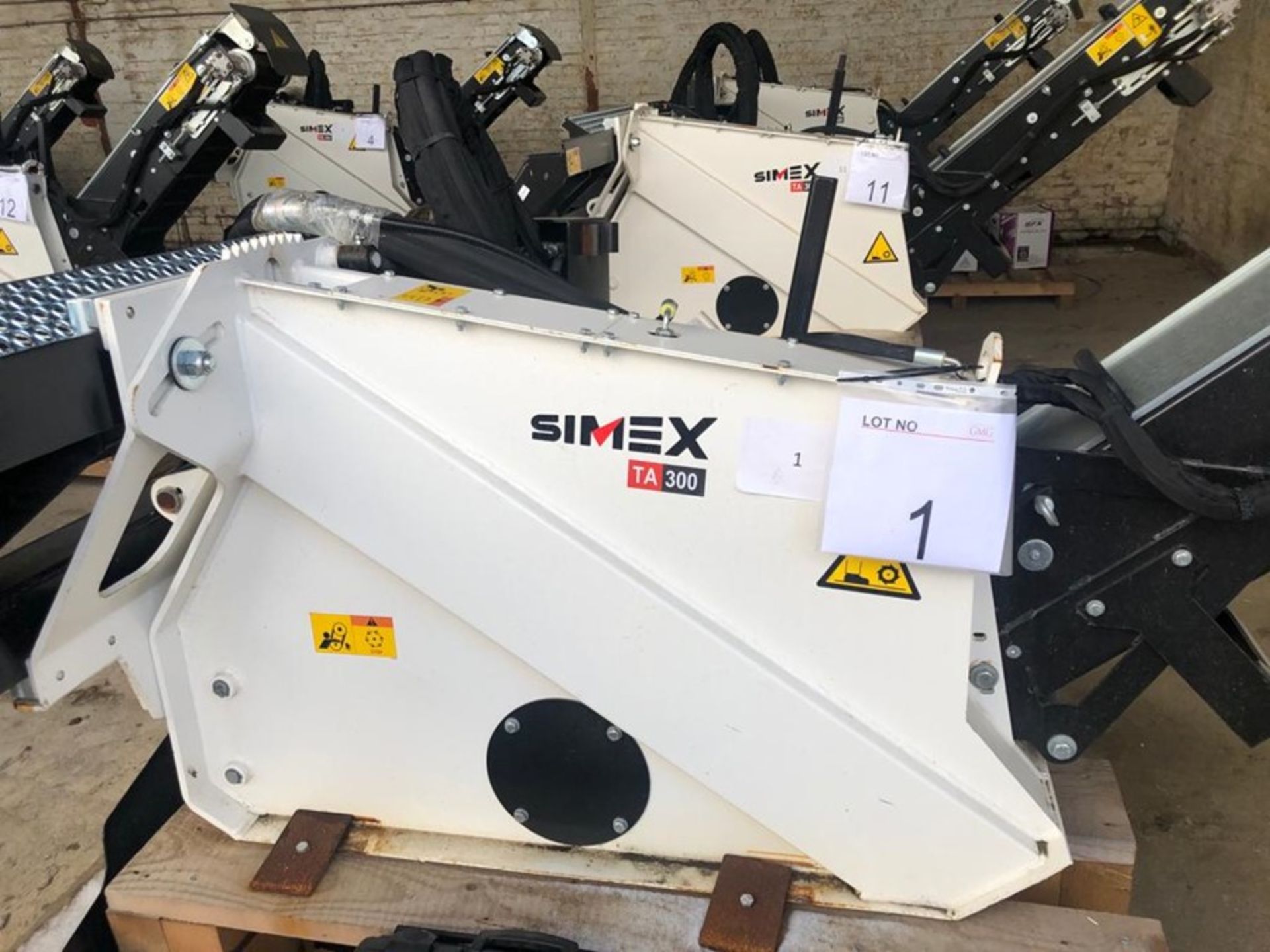 Unused Simex model TA300 wheel saw with waste conveyor, serial no. MO24789B14, Year - 2018