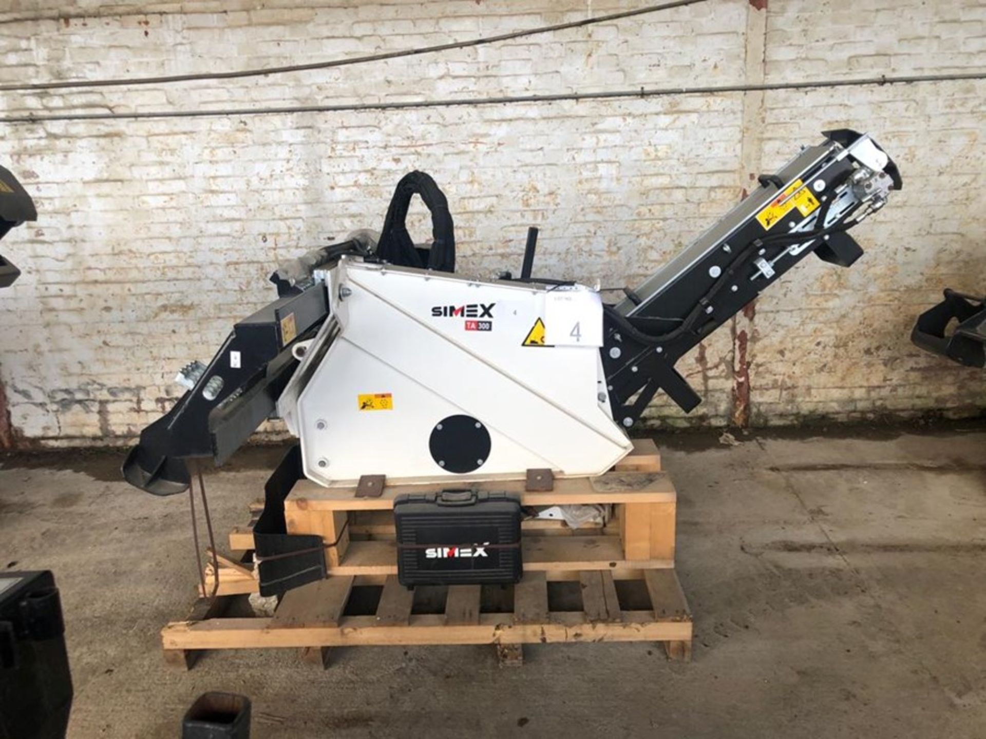 Unused Simex model TA300 wheel saw with waste conveyor, serial no. MO24791B14, Year - 2018