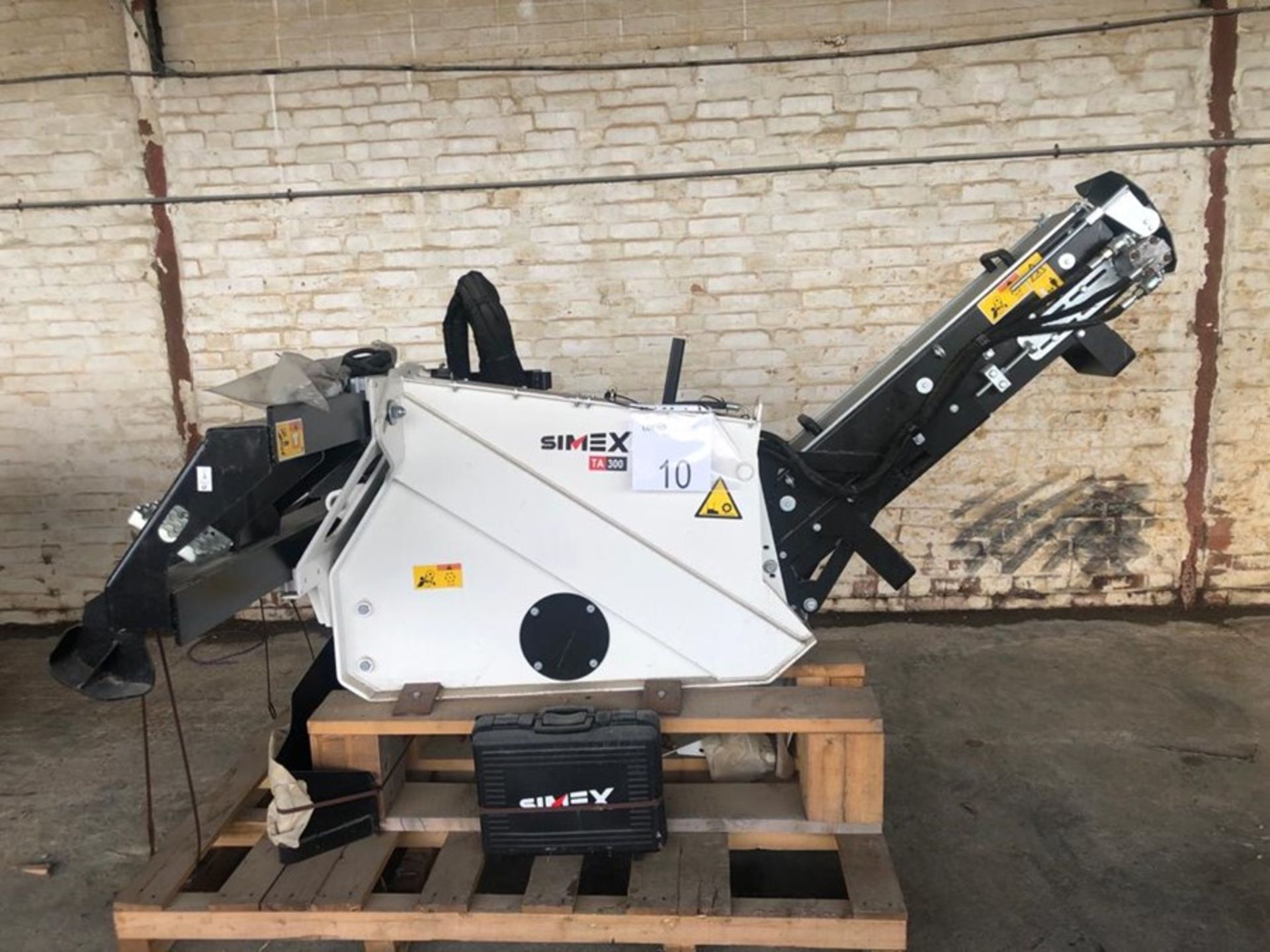 Unused Simex model TA300 wheel saw with waste conveyor, serial no. MO24793B14, Year - 2018