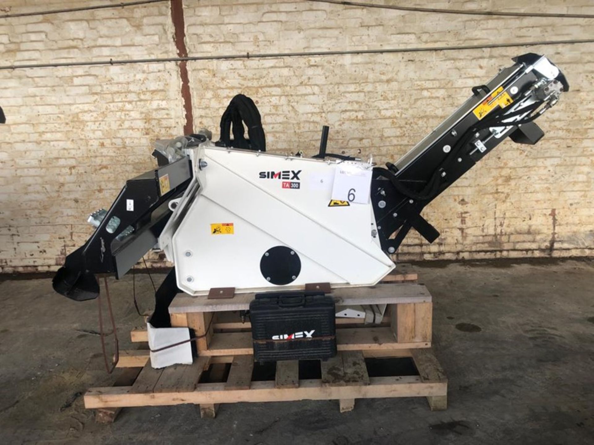 Unused Simex model TA300 wheel saw with waste conveyor, serial no. MO24790B14, Year - 2018