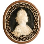 Peter the Great. Walrus ivory cameo cutout on a black field, ivory lattice border.