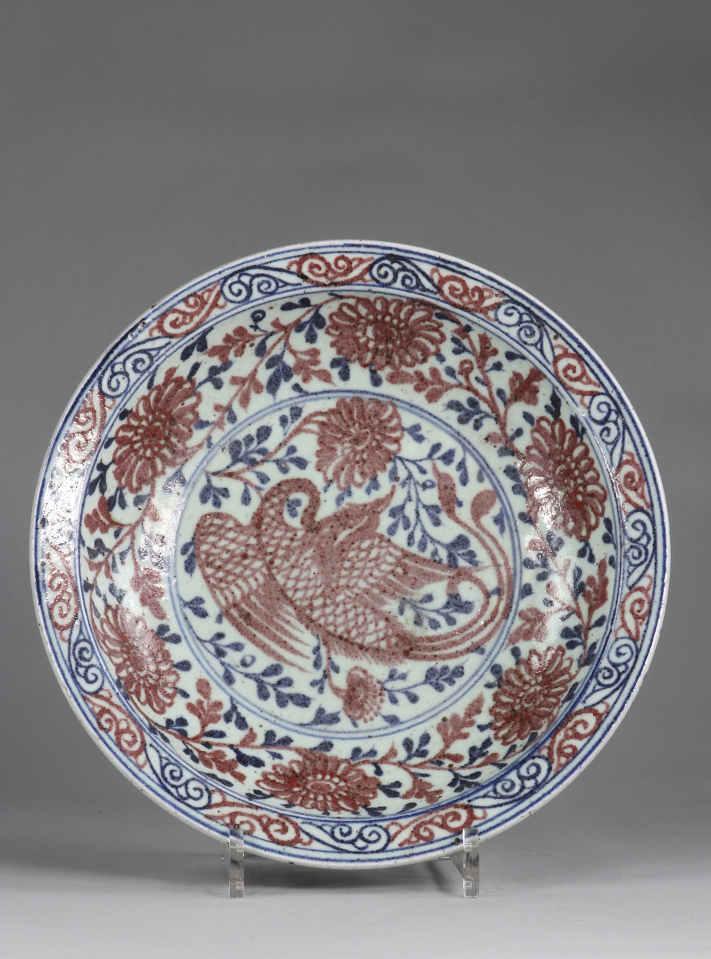 China dish, Yuan, decorated with a Phoenix, in Copper Red, on a background of Chrysanthemums, painte
