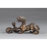 China chimera, in gray-green jade, representing a lioness with her cub, finely executed archaic work