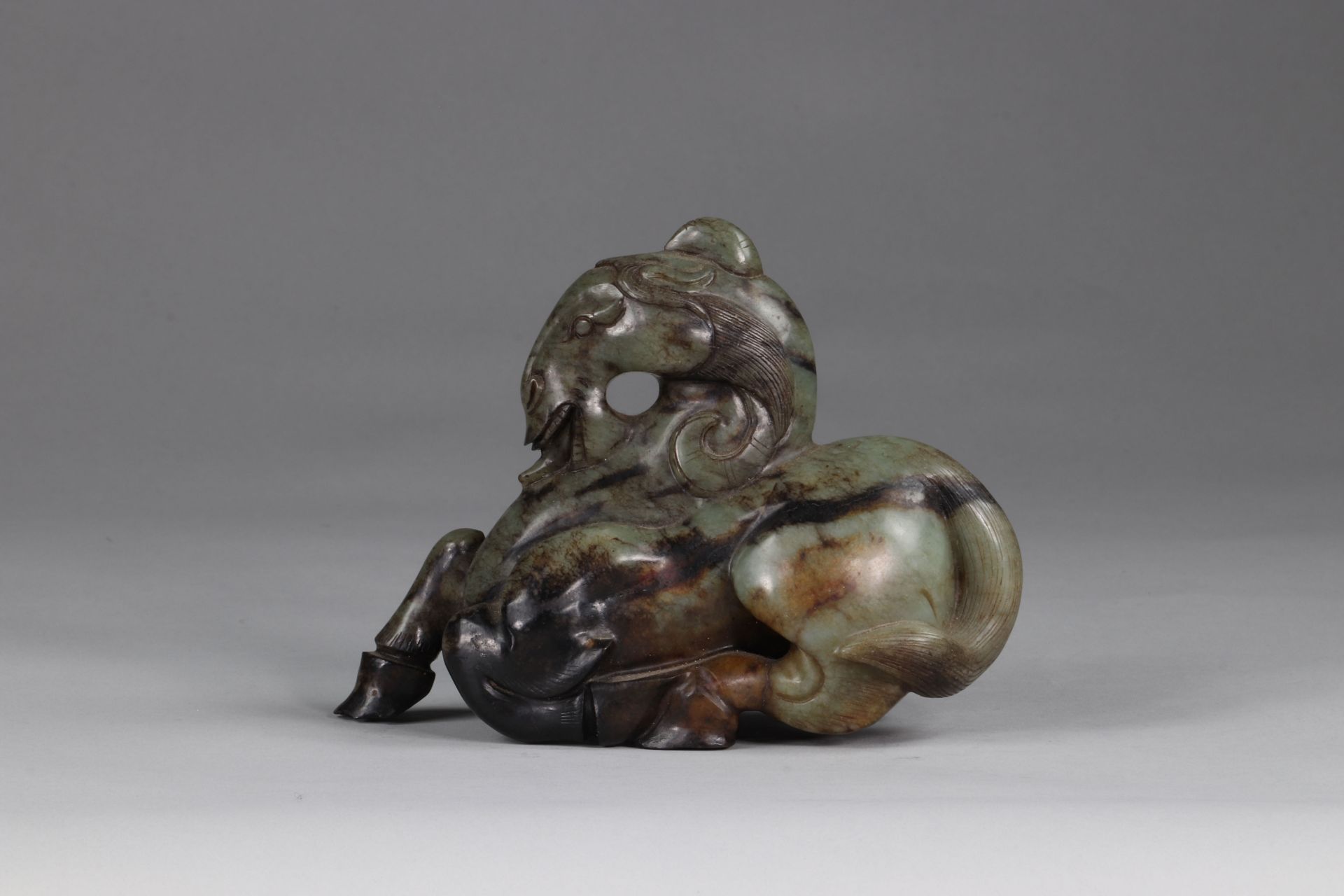 China chimera in the form of a horse in a lying position green color, archaic or archaic work