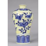 Meiping Sanduo vase with yellow background decorated with flowers