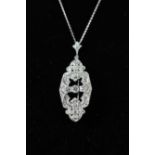 Art Deco pendant brooch in platinum and diamonds + - 2ct circa 1930