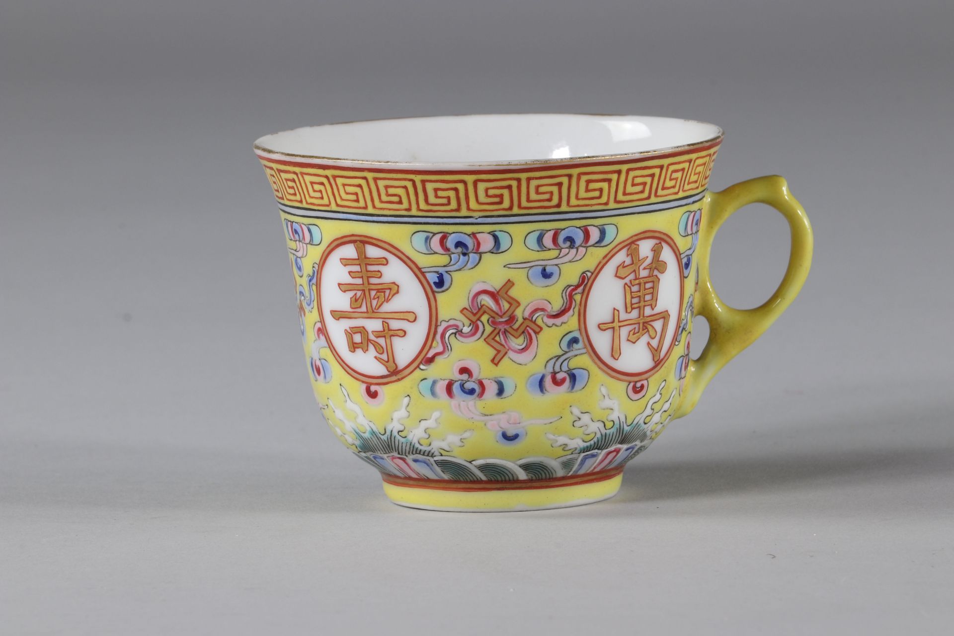 Imperial yellow porcelain cup, Guangxhu mark and period. China around 1900.