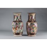 CHINA, Nanjing. Pair of baluster vases decorated with Chinese warriors. Mark.