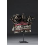 China hat decorated with silver decoration of flowers circa 1900