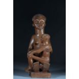 Maternity Kuba carved wood "carries an inventory number" 20th