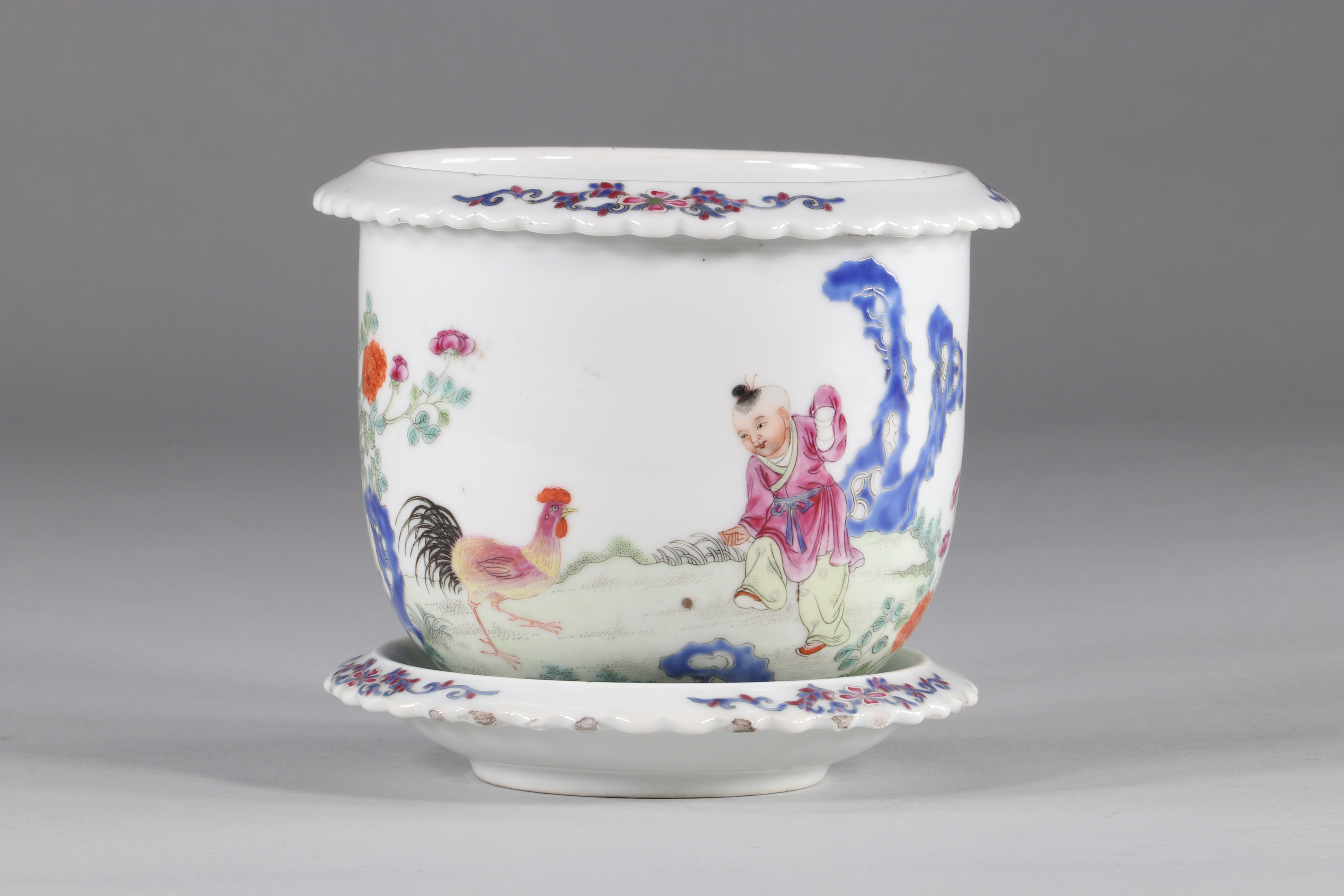 Famille rose porcelain flowerpot, decorated with a child and a rooster. "Chicken boy"