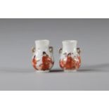 Pair of iron red porcelain vases with character decoration, Republic period China.