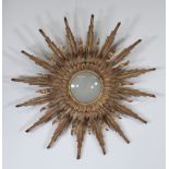 Large "double" sun mirror in gilded wood