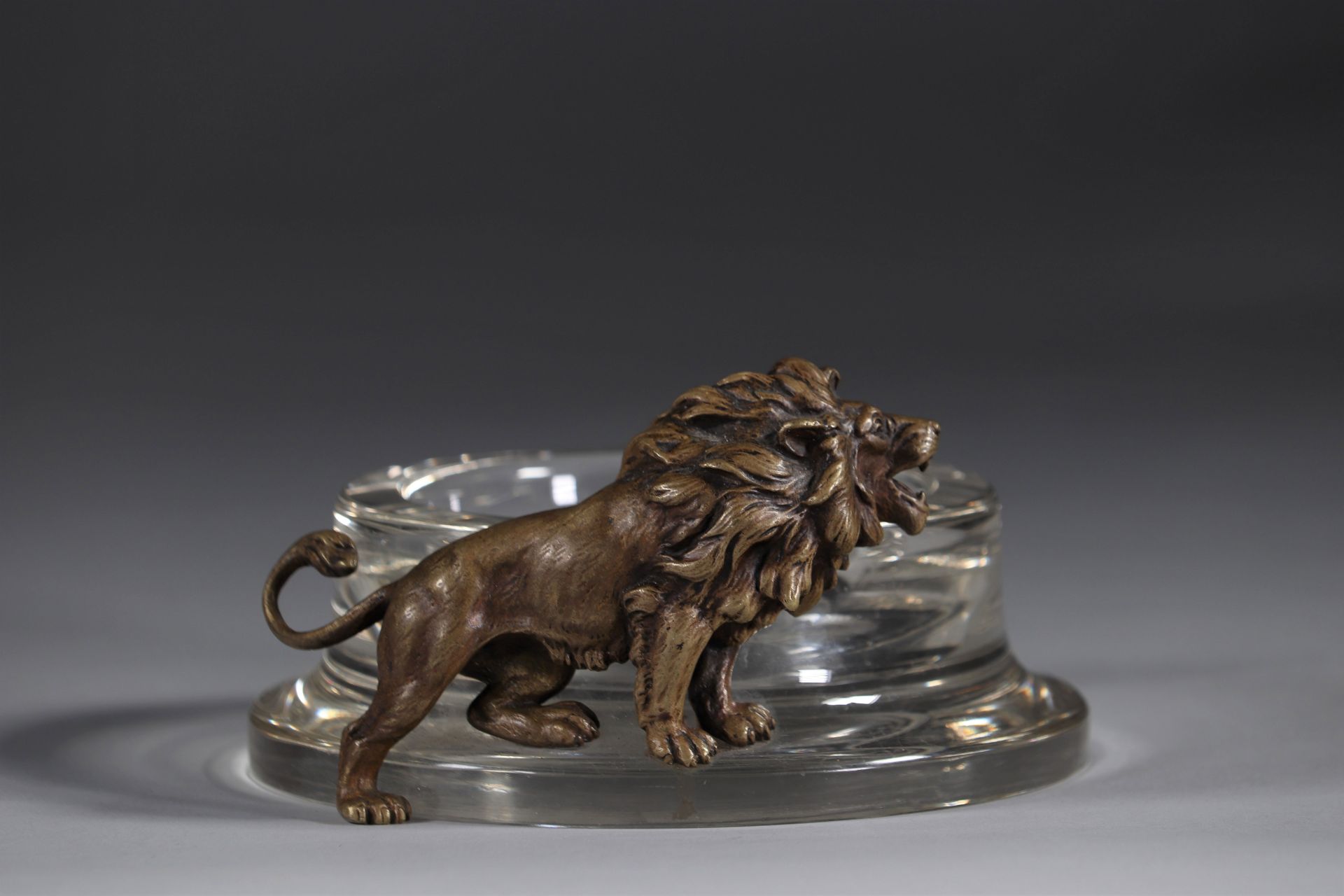 Bottle holder in bronze lion and crystal