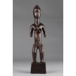 Bete, Republic of Côte d'Ivoire, nude female statuette with ancestral scarifications, wood, old brow