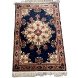Kashan souf silk carpet with silver and gold threads Iran, rich floral decoration on a blue backgrou