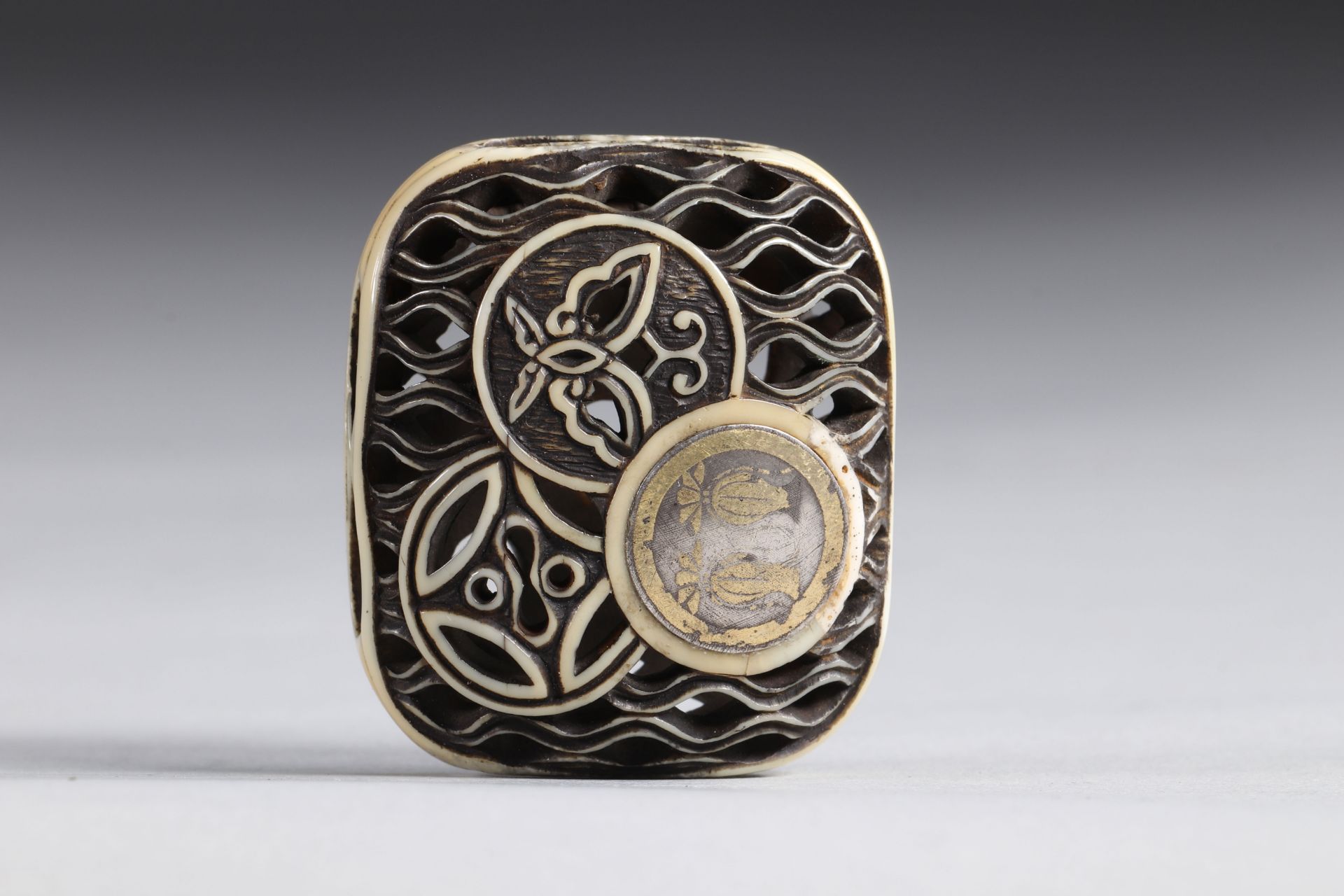 Netsuke Manju carved - a fine openwork decoration. Japan Edo period