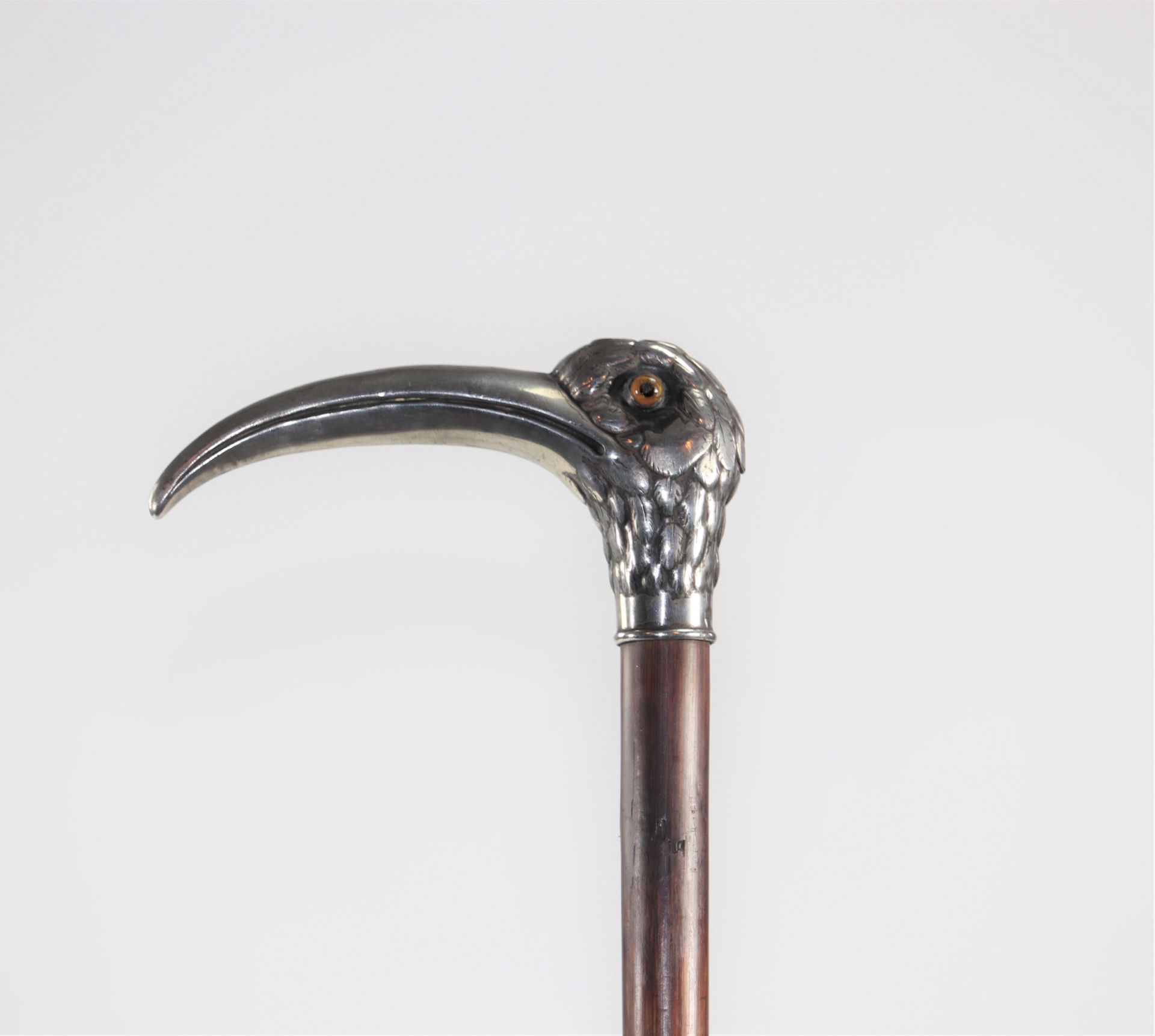 Pommel cane decorated with a silver bird circa 1900