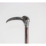 Pommel cane decorated with a silver bird circa 1900
