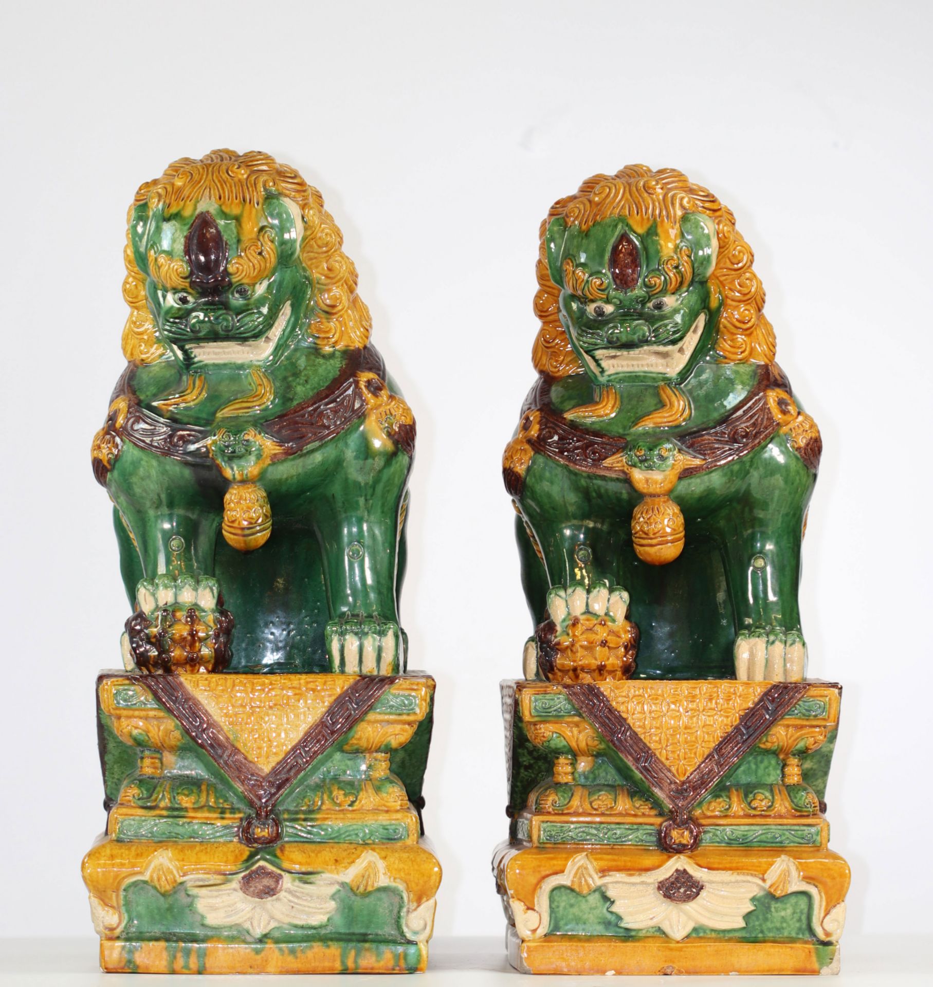 China pair of enamelled stoneware dog